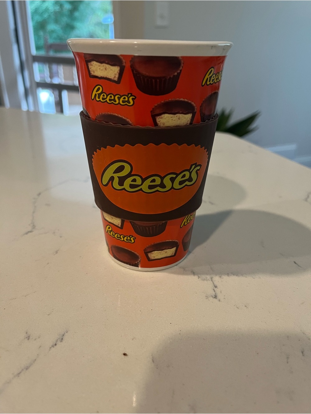 Orange Ceramic Travel Cup with Brown Silicone Sleeve